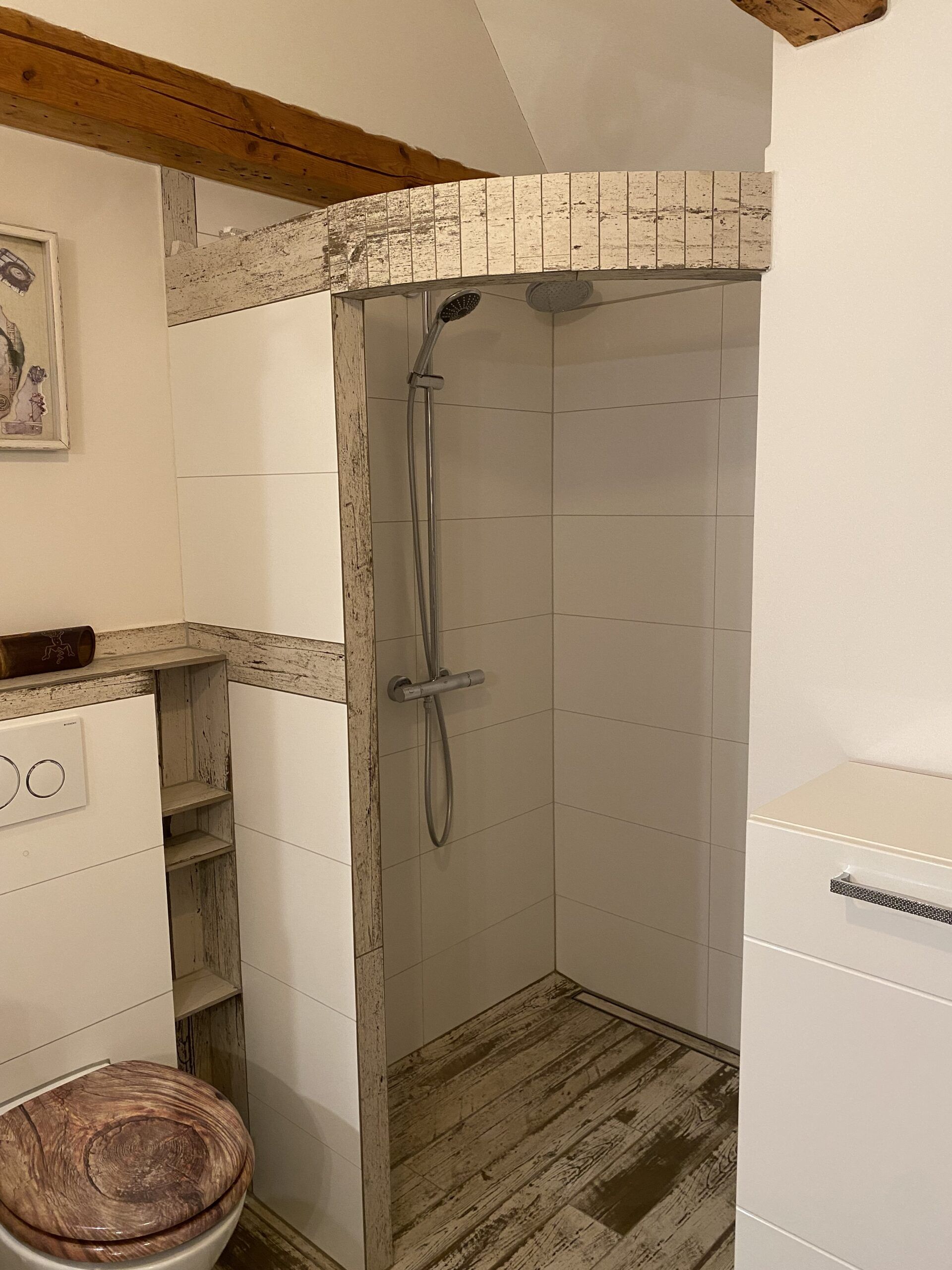 Dusche mit Rundbogen